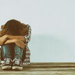 Sad woman hug her knee,nobody